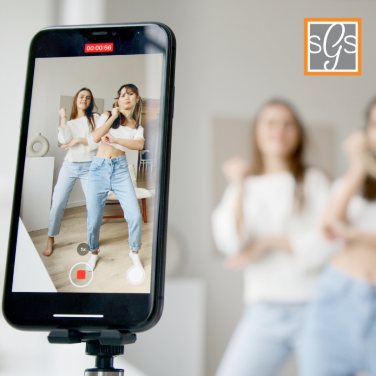 2 Teen Girls recording a tiktok video
